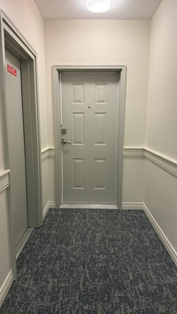 Stairwell walls repainted at 15555 16A Avenue, Surrey