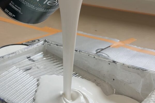 Pouring Sherwin Williams paint for interior project Vancouver BC